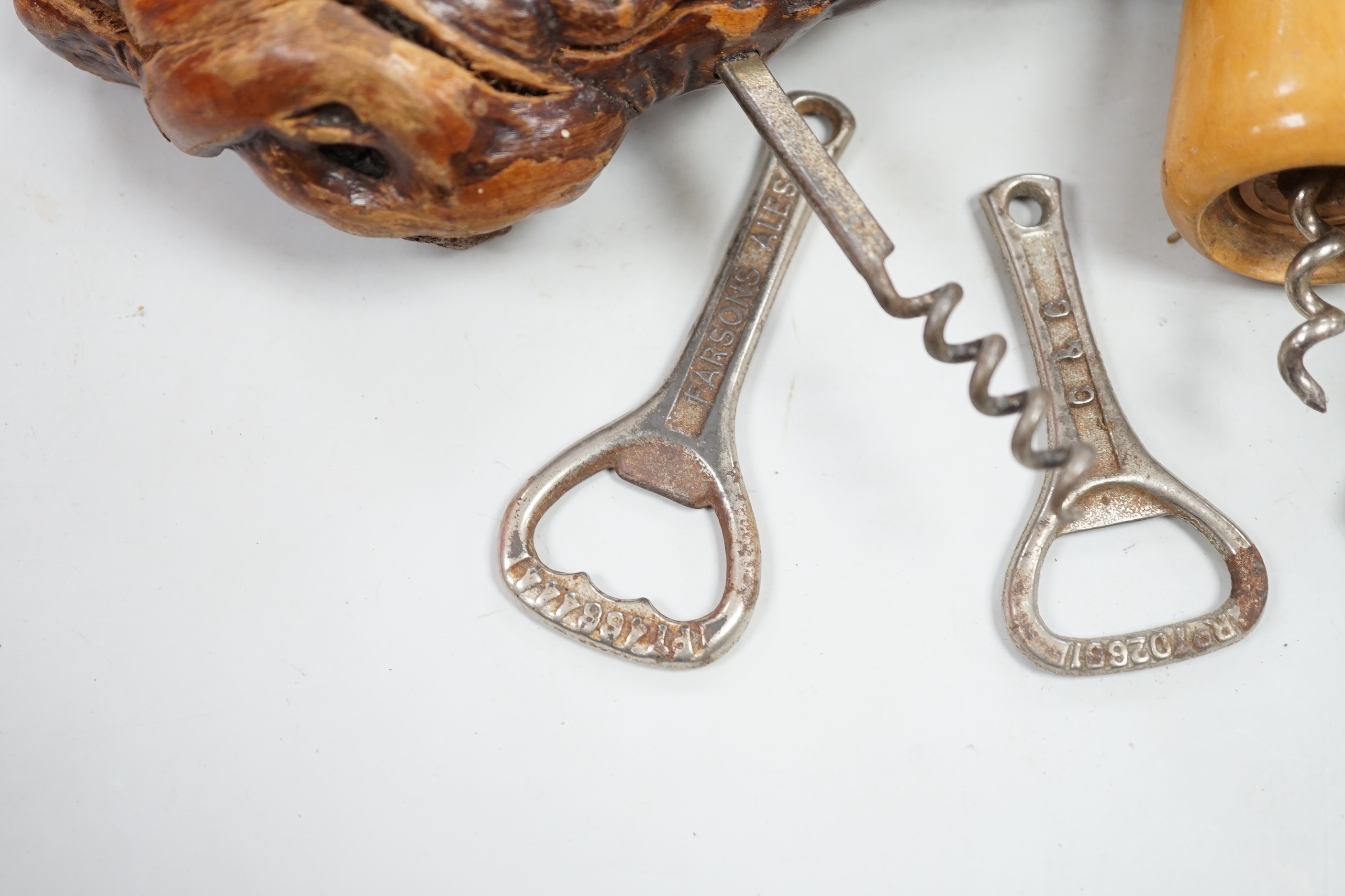 A collection of various corkscrews, bottle openers etc.